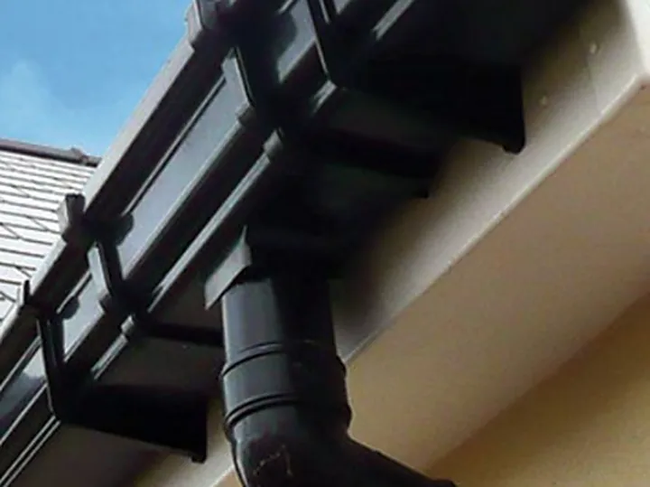 New black uPVC guttering and downpipe